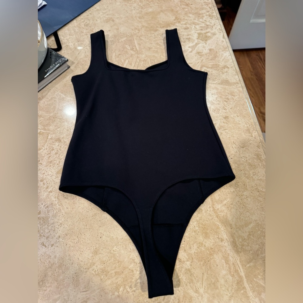 Like new black body suit